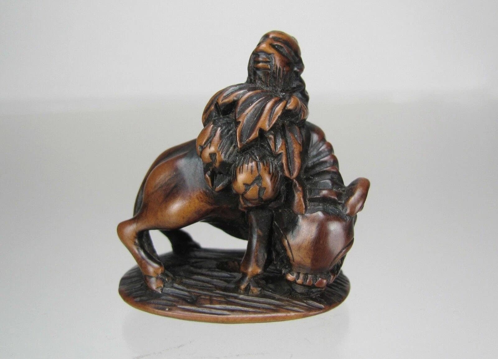 Early 19th Century Edo School Boxwood Netsuke: Chinese Sage Riding an Ox