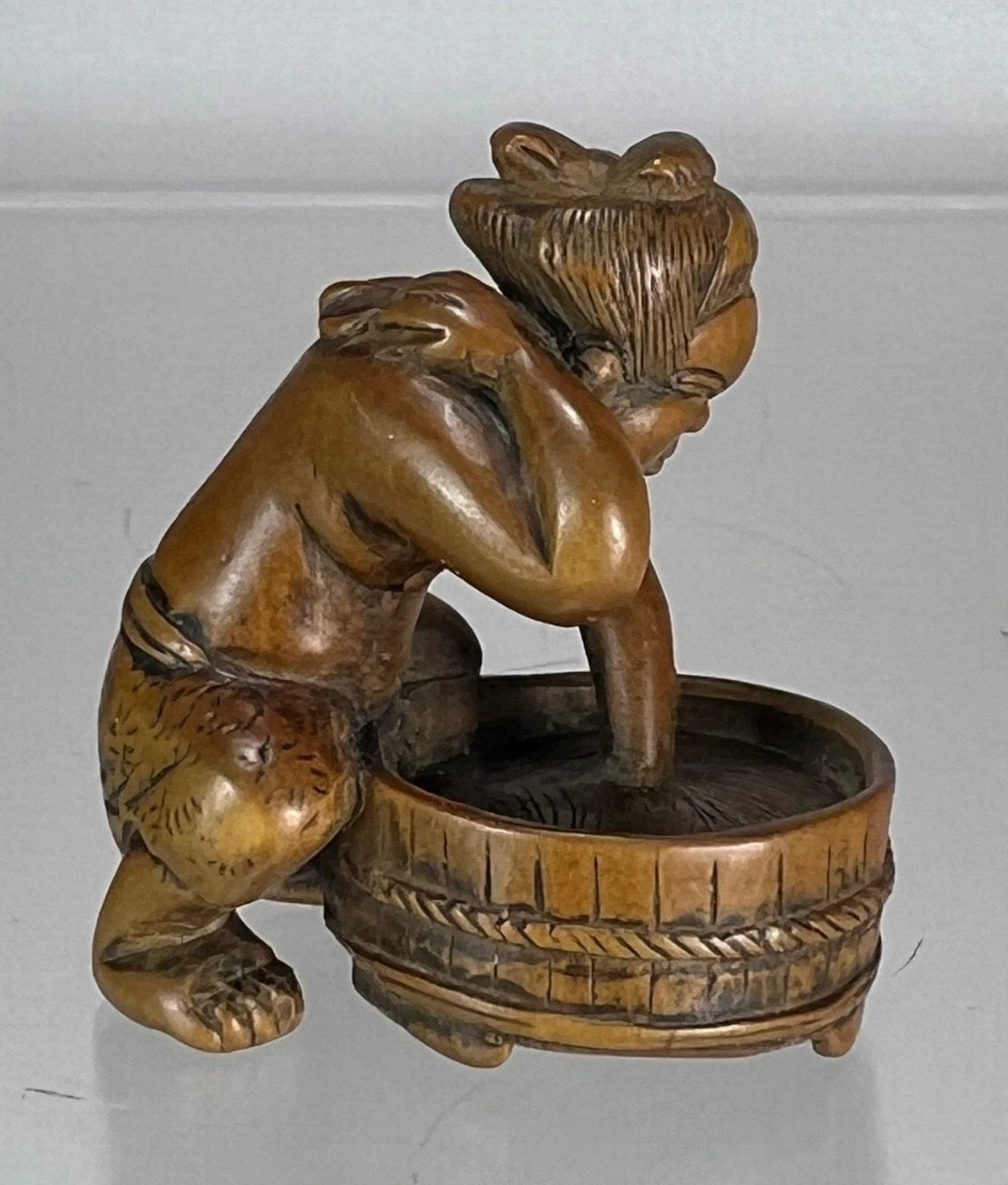 Japanese Boxwood Netsuke - OKAME Taking a Bath, 19th C.