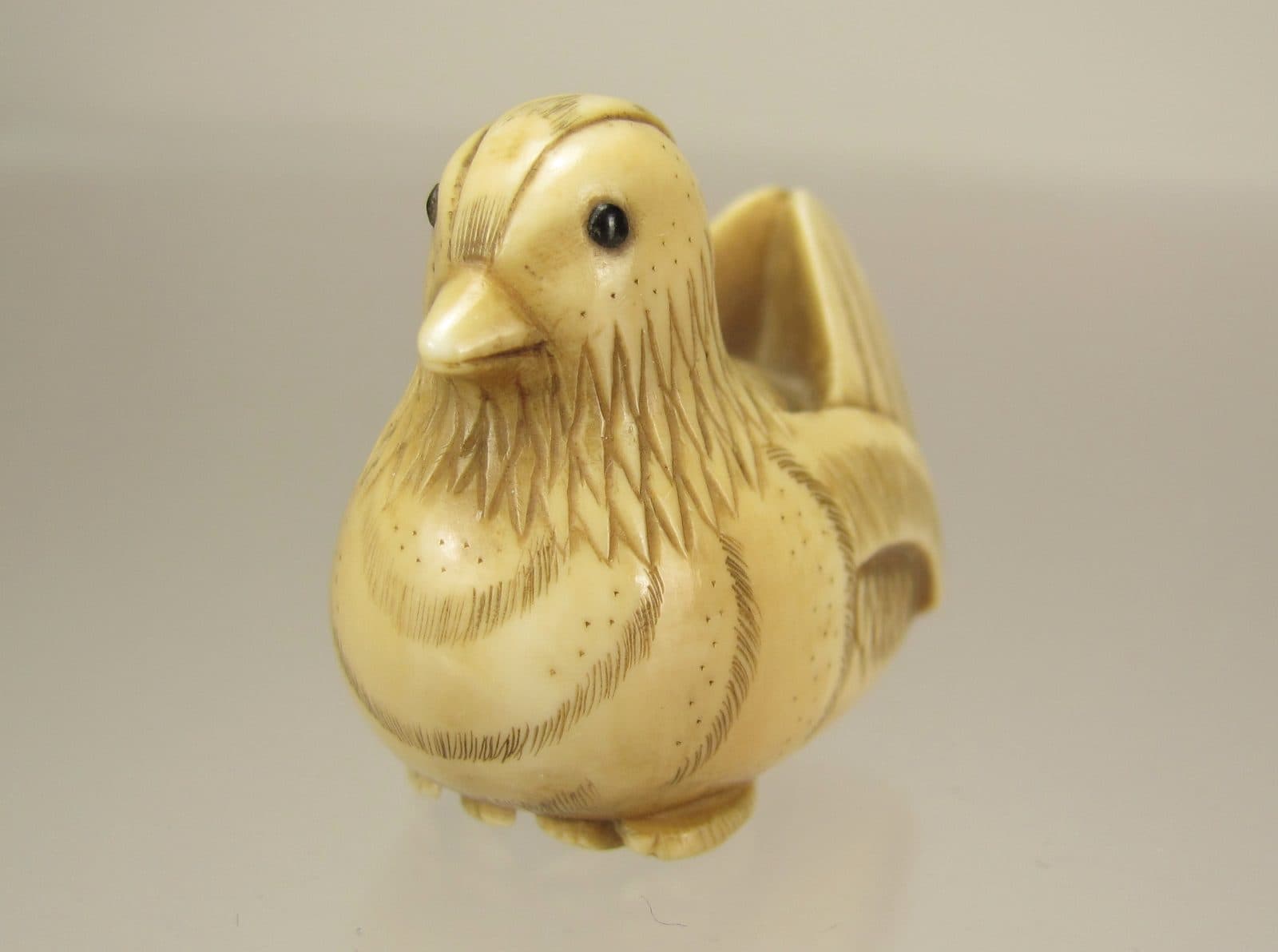 OHARA MITSUHIRO - A fine netsuke of a Pigeon
